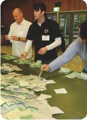 A photo of votes being counted